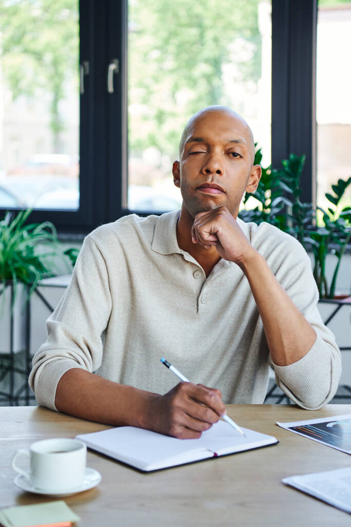 professional headshots, man with ptosis taking notes, bold african american businessman looking at camera, dark skinned office worker with myasthenia gravis disease, diversity and inclusion  - Photo, Image