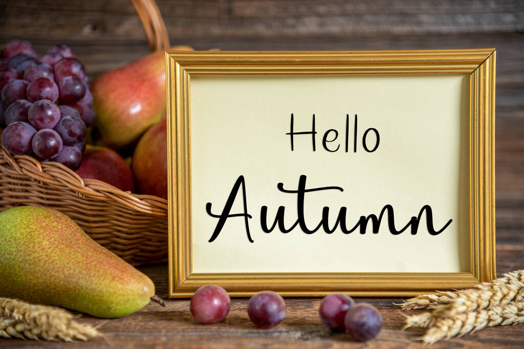 Décoration d'automne avec poires, pommes et raisins, fond d'Action de grâce, saison d'automne et texte Bonjour Automne - Photo, image
