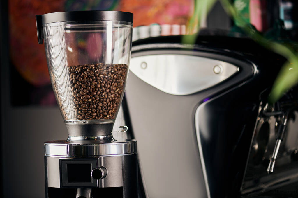 professional coffee grinder with roasted and whole coffee beans, barista equipment, coffee shop - Photo, Image