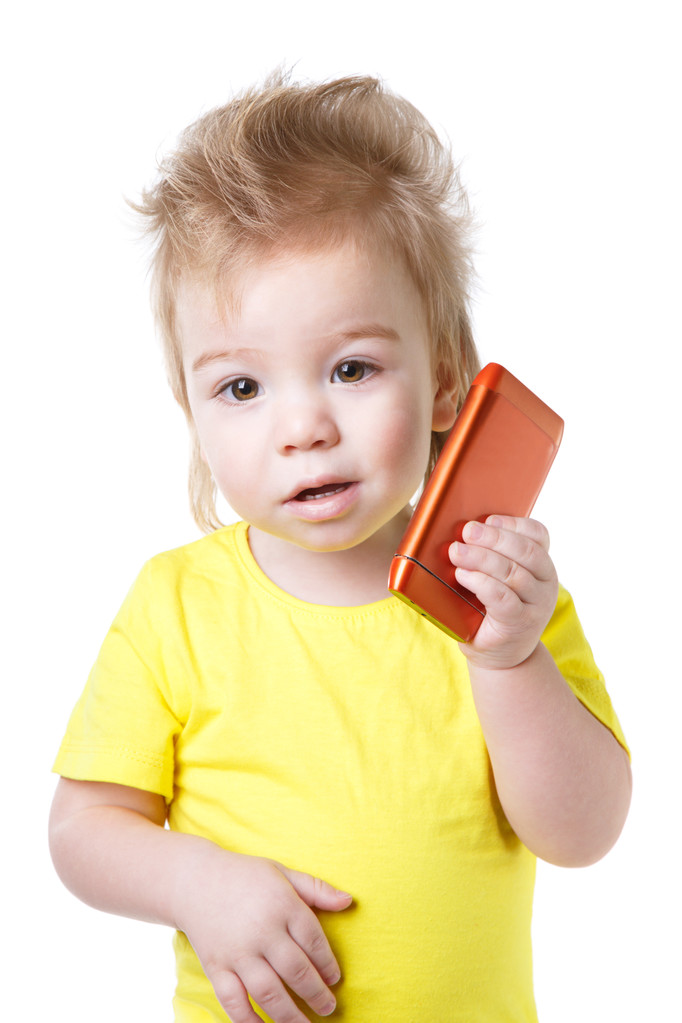 Дитина в жовтій фітболі розмовляє на мобільному телефоні
 - Фото, зображення
