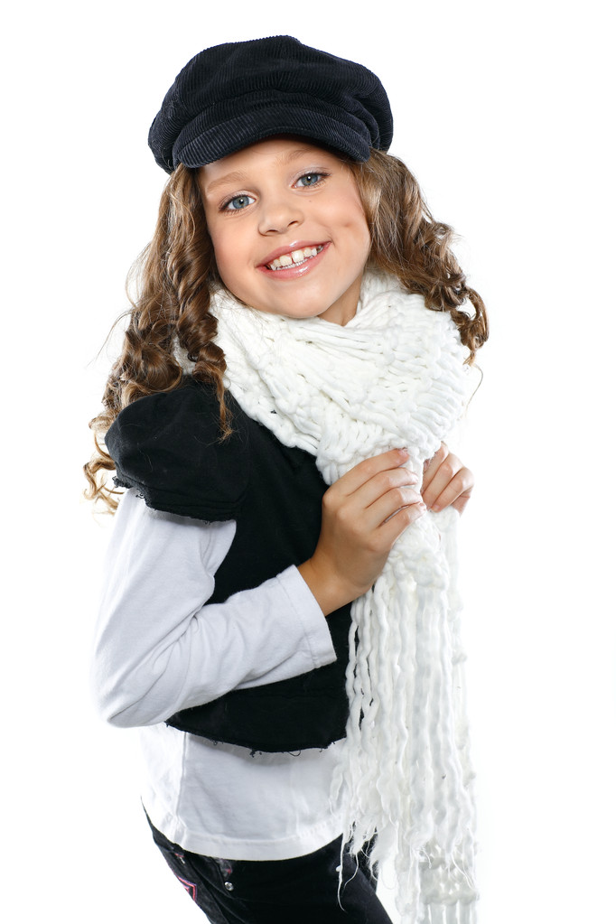 A little beautiful girl is in autumn clothes, isolated on a white backgroun - Photo, Image