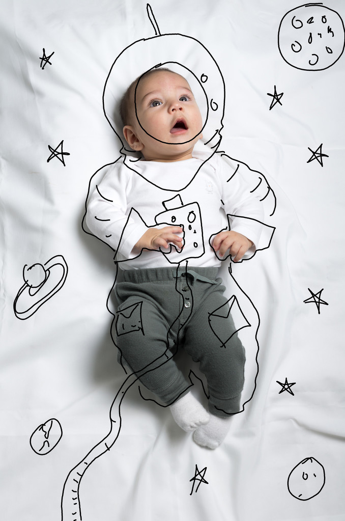 Aranyos baba fiú űrhajós hely dekoráció vázlat - Fotó, kép