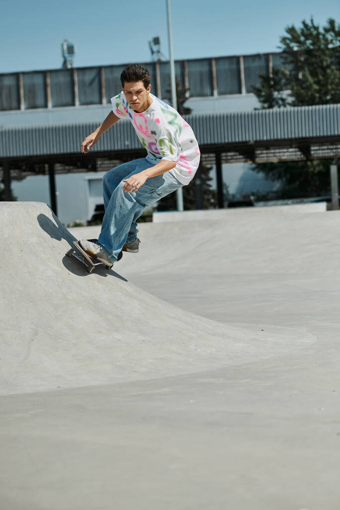 A fearless young skater boy defies gravity, riding his skateboard up the side of a ramp in a sunny outdoor skate park. - Photo, Image