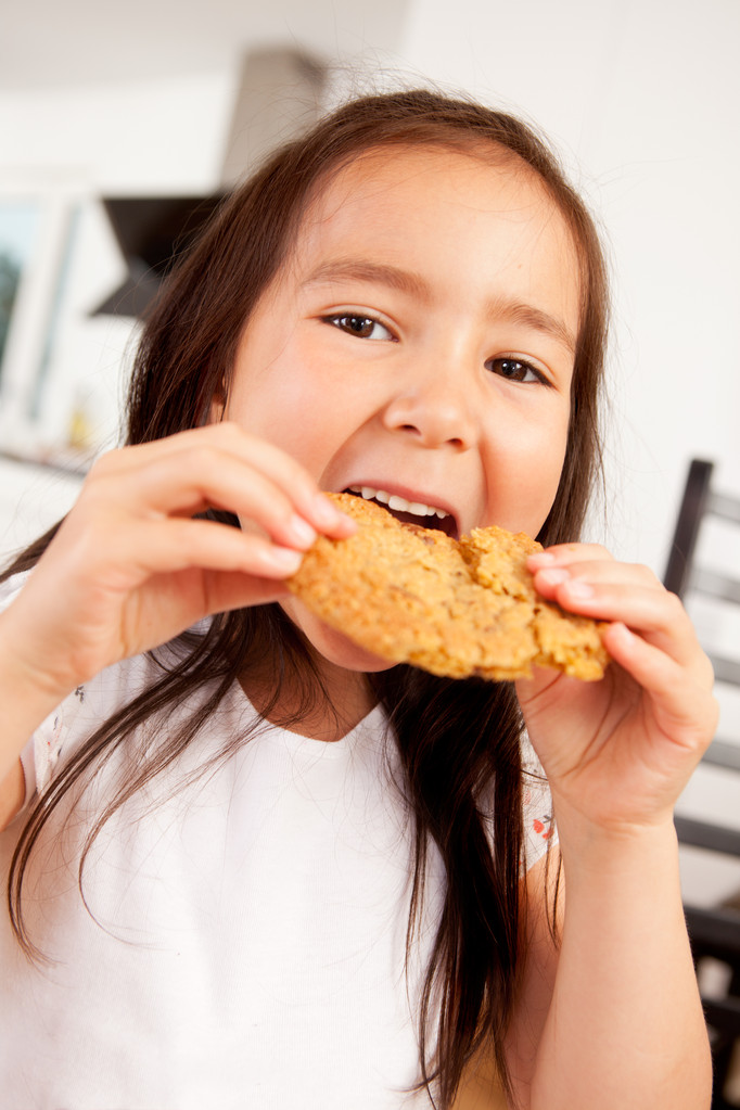 Young Girl Eating Cookie - Photo, Image