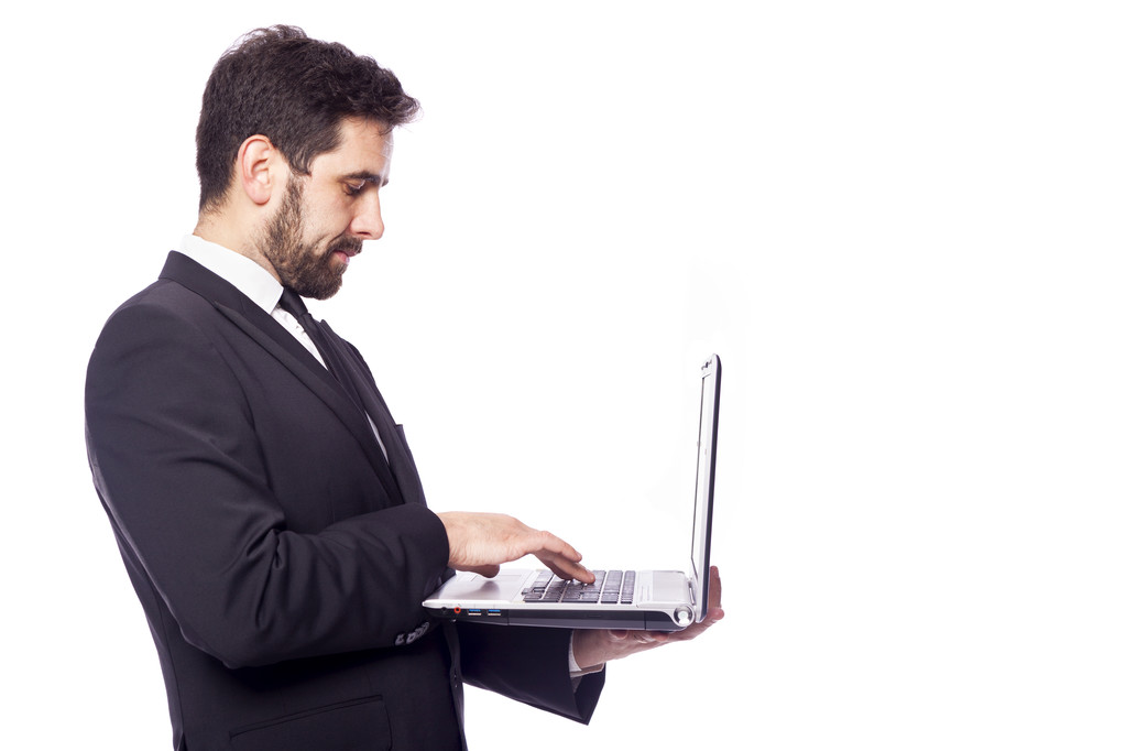 Liikemies työskentelee kannettavan tietokoneen kanssa
 - Valokuva, kuva