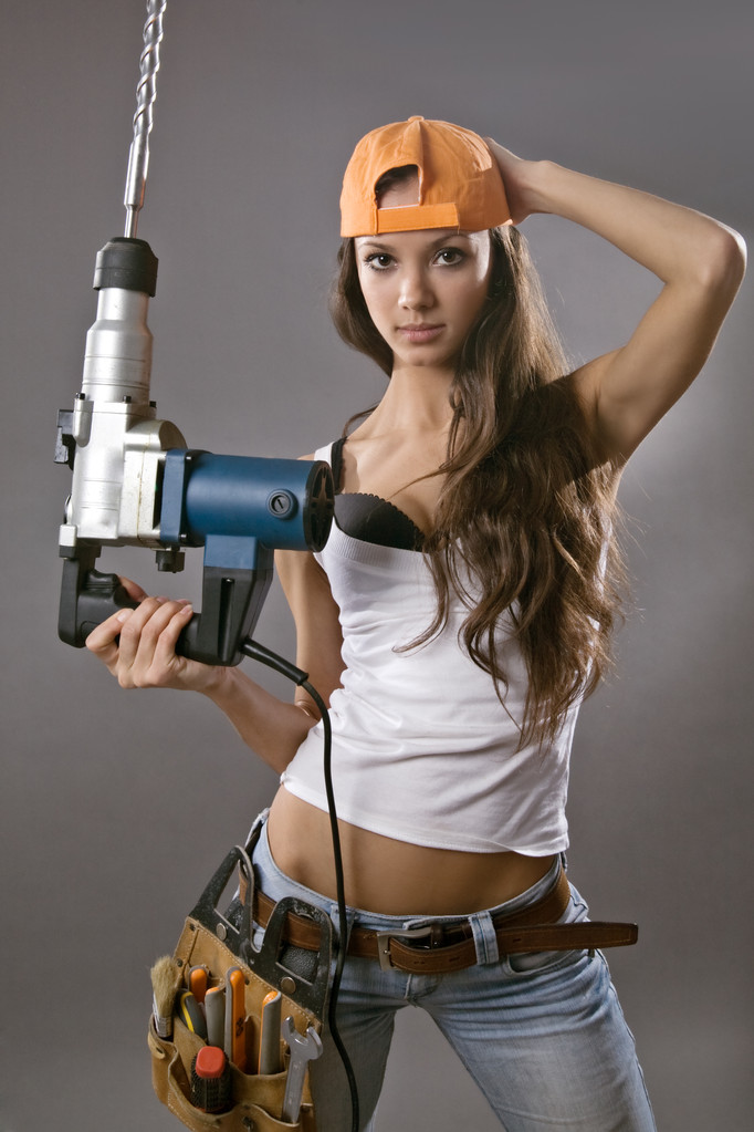 Seksikäs nuori nainen rakennusalan työntekijä
 - Valokuva, kuva