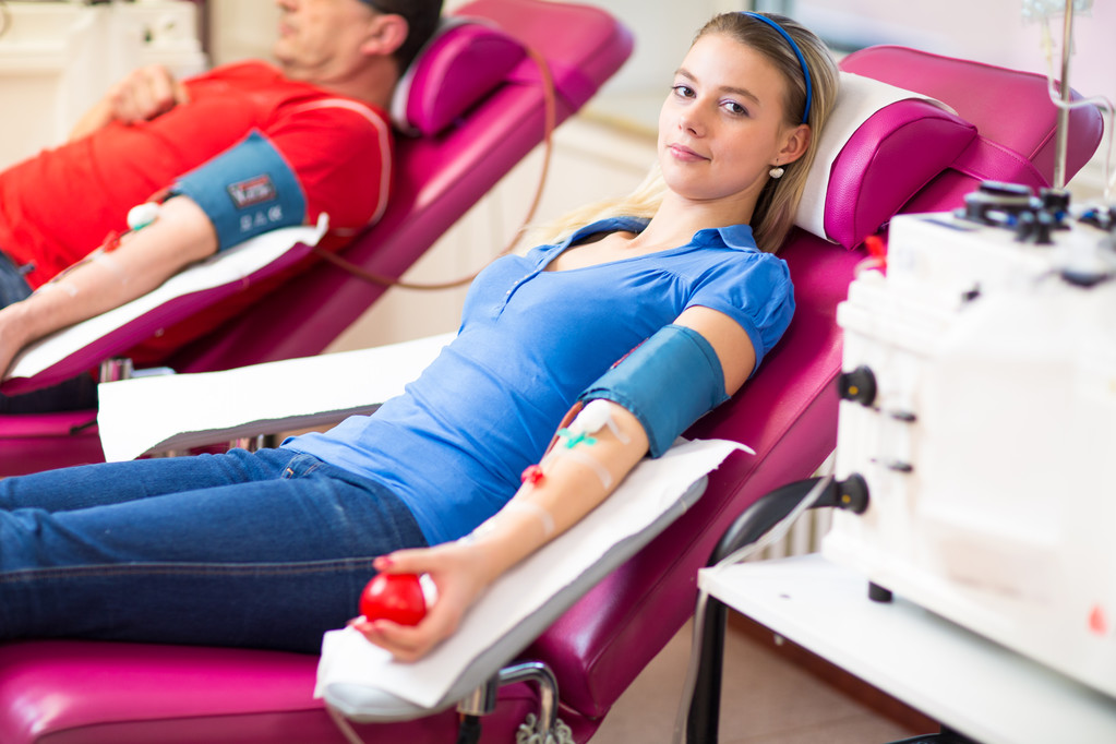 woman giving blood in a modern hospital - Photo, Image