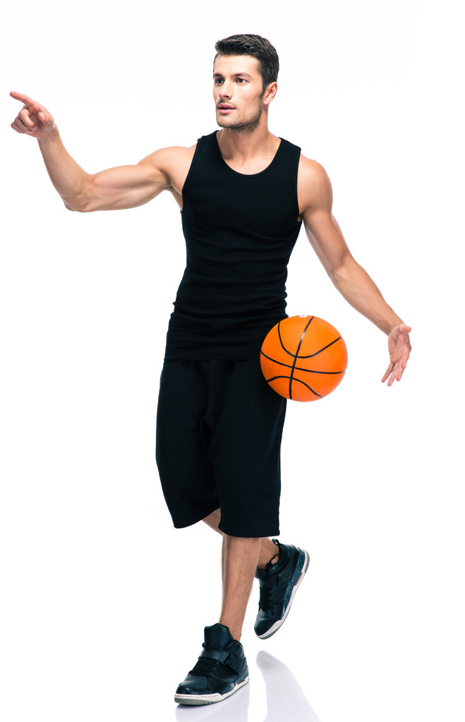Portrait of a sports man playing in basketball - Photo, Image