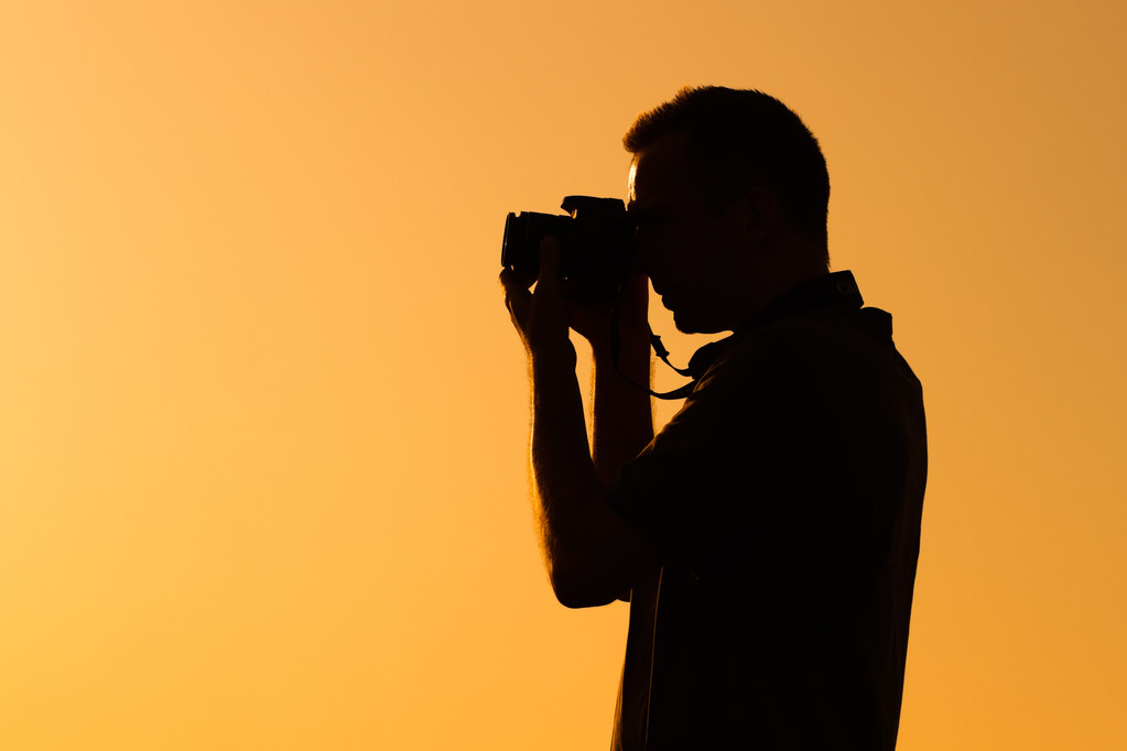 Silhouette des fotografierenden Menschen - Foto, Bild
