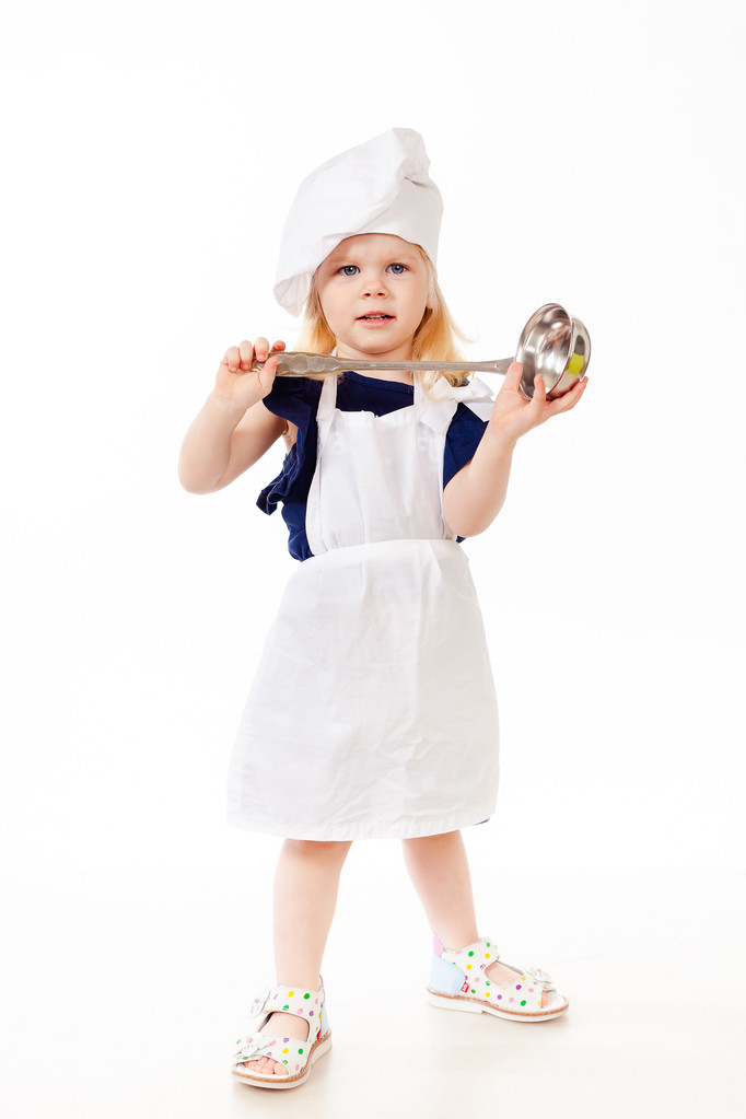 Krásné dítě stojící s naběračku na polévku v rukou  - Fotografie, Obrázek