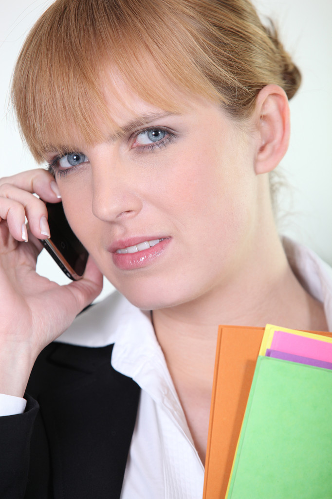 Office worker using a mobile phone - Photo, Image