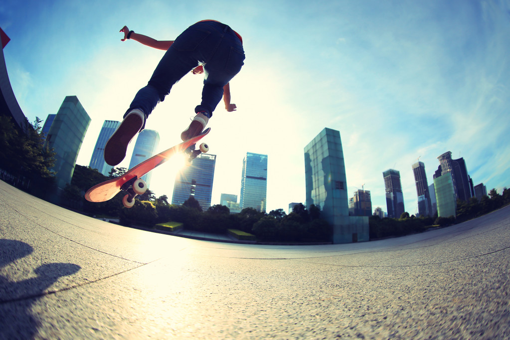 female skateboarding at city - Photo, Image