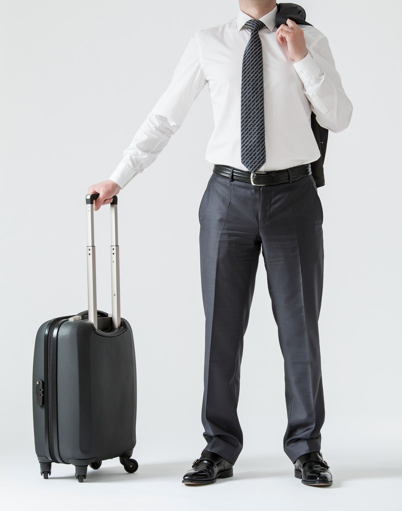 Onherkenbaar zakenman met een koffer - Foto, afbeelding