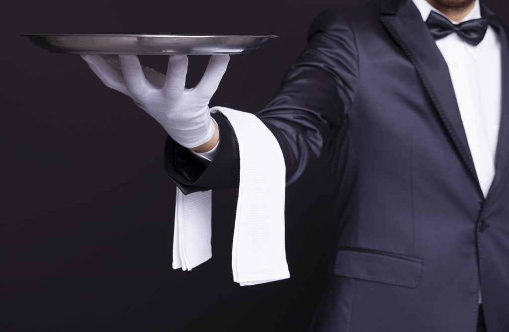 Waiter holding an empty silver tray - Photo, Image
