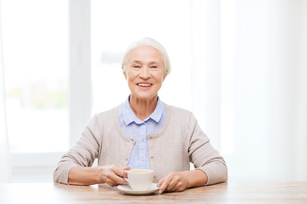 happy senior woman with cup of coffee - Photo, Image
