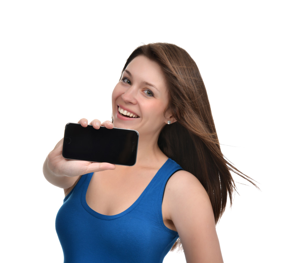 Mulher jovem mostrar exibição de telefone celular com branco preto s
 - Foto, Imagem