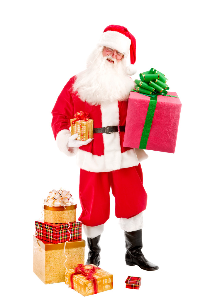 Santa drží vánoční dárek v jeho rukou na bílé poz - Fotografie, Obrázek