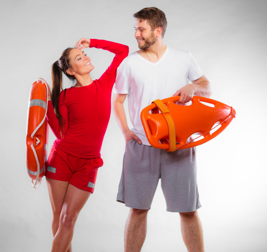 lifeguard couple with rescue equipment - Photo, Image