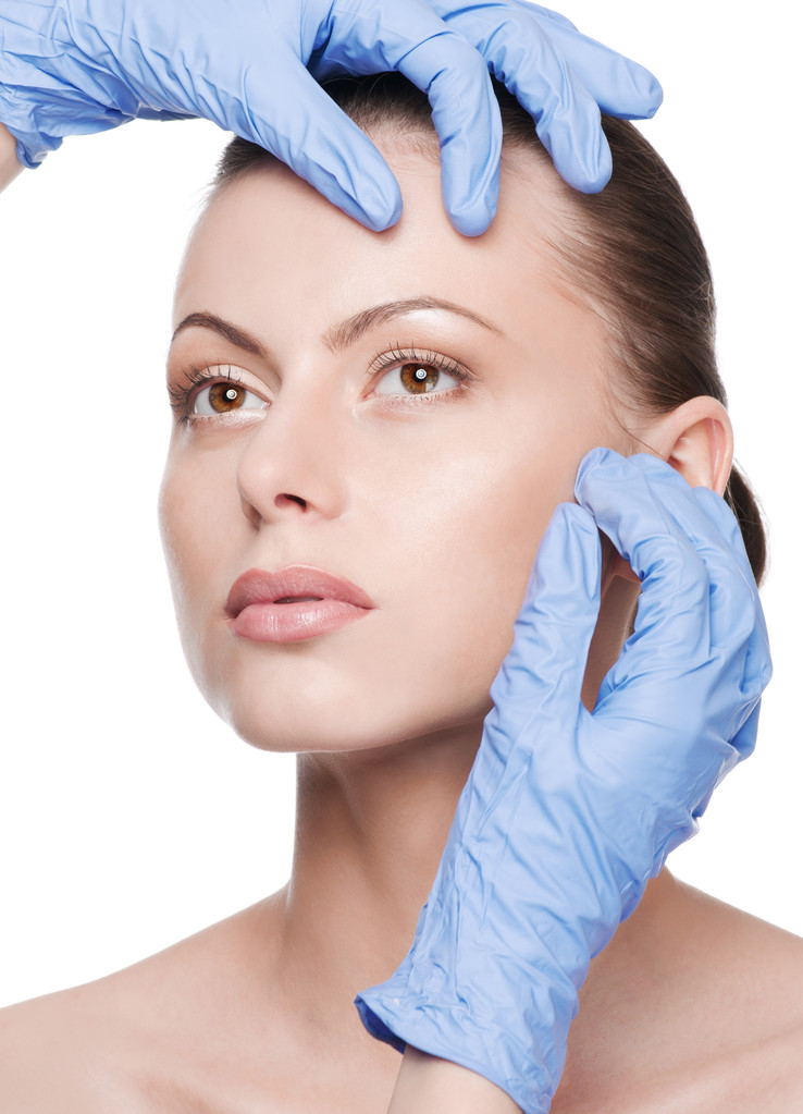 Beautician touch and exam health woman face - Photo, Image