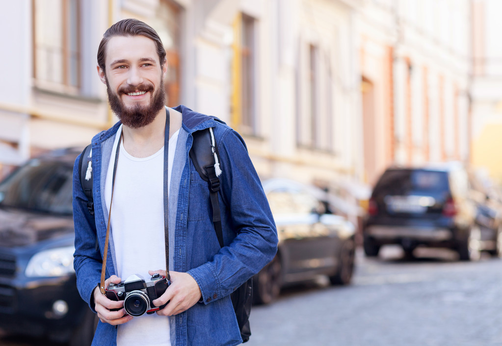 Cheerful bearded tourist is making his journey - Fotoğraf, Görsel