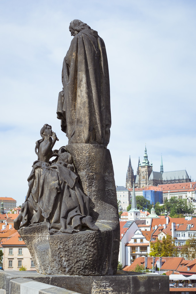 Sculpture of a few people on the fence of the Charles Bridge - Photo, Image
