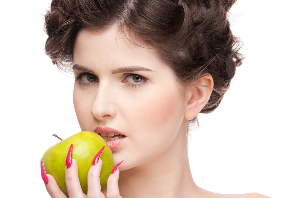 Close up portrait of beauty woman with green apple. - Photo, Image