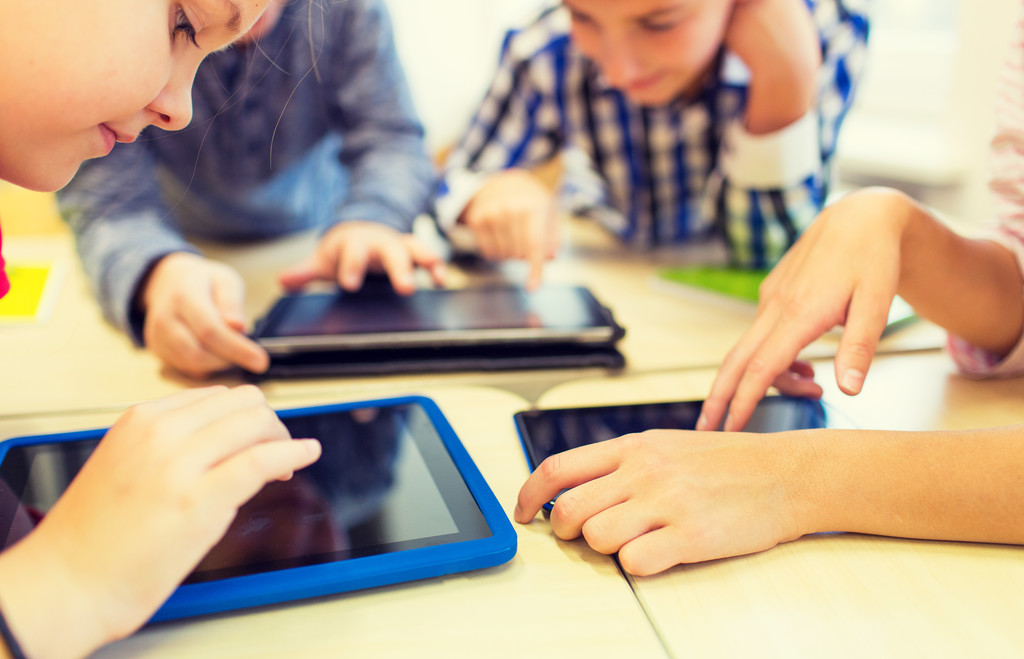 close up of school kids playing with tablet pc - Φωτογραφία, εικόνα