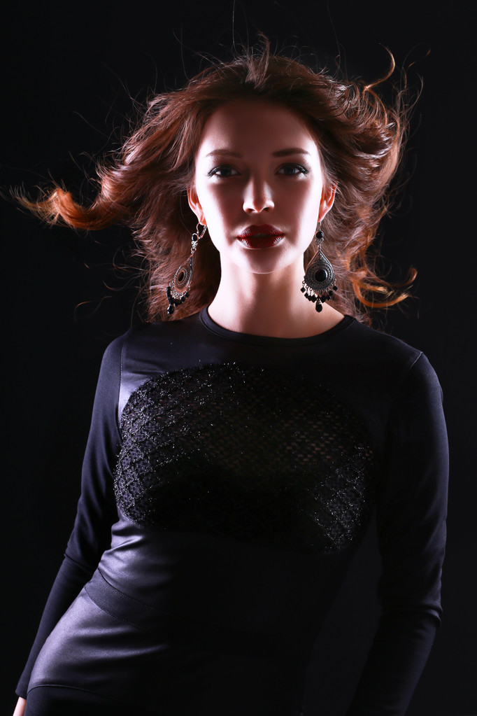 Portrait of beautiful brunette woman in black dress - Photo, Image