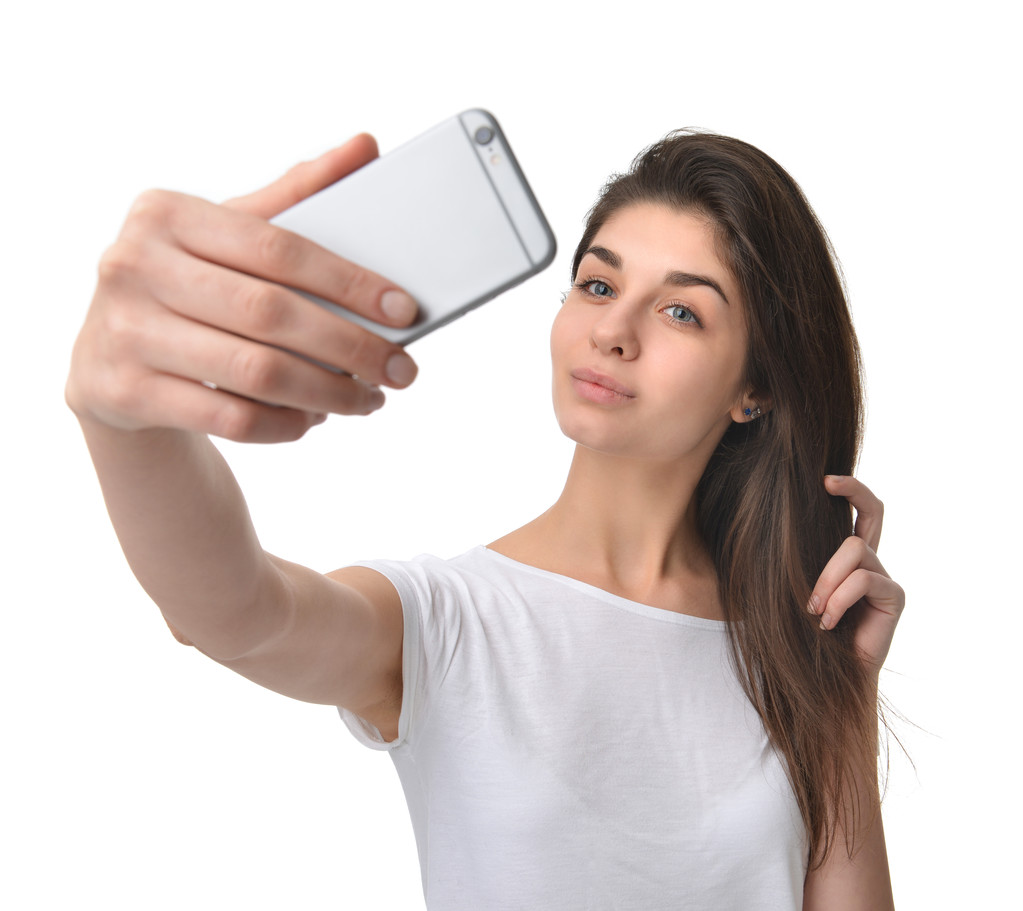 Joven bonita mujer hacer autorretrato selfie con su teléfono celular
 - Foto, Imagen
