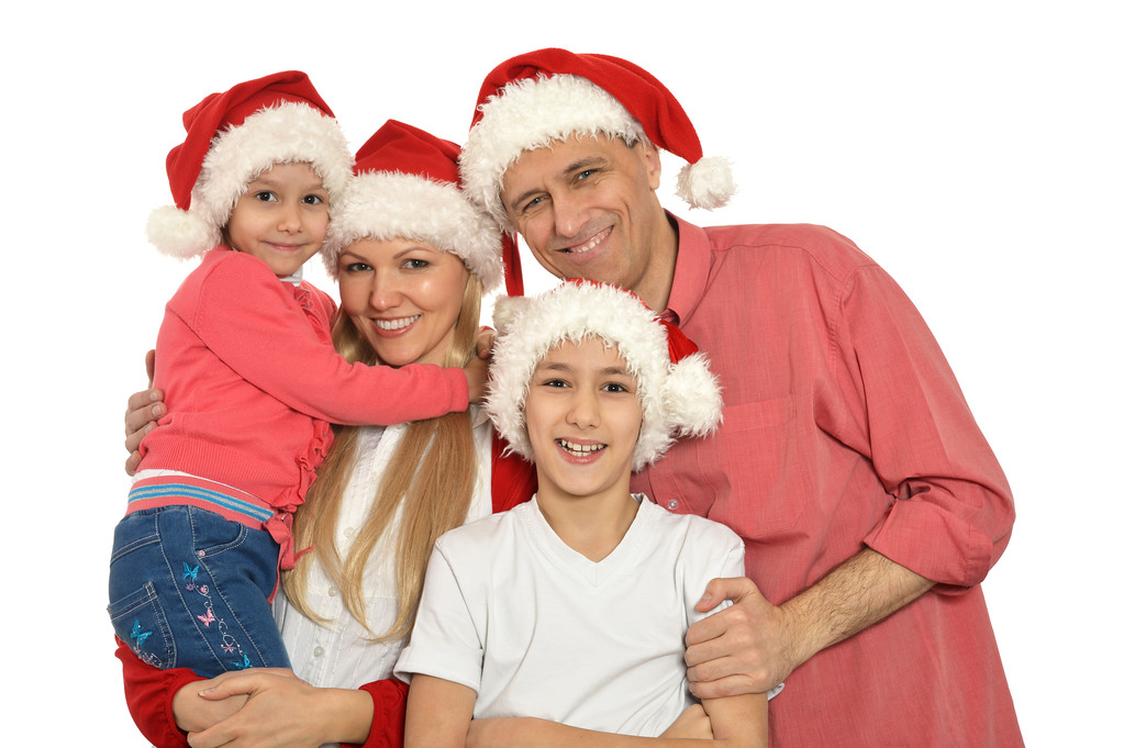 familia con gorras navideñas
 - Foto, imagen