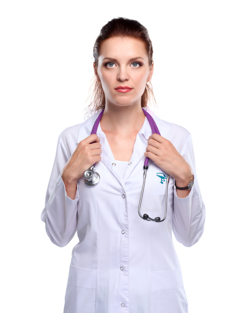 Retrato de una joven doctora con una bata blanca de pie
 - Foto, Imagen