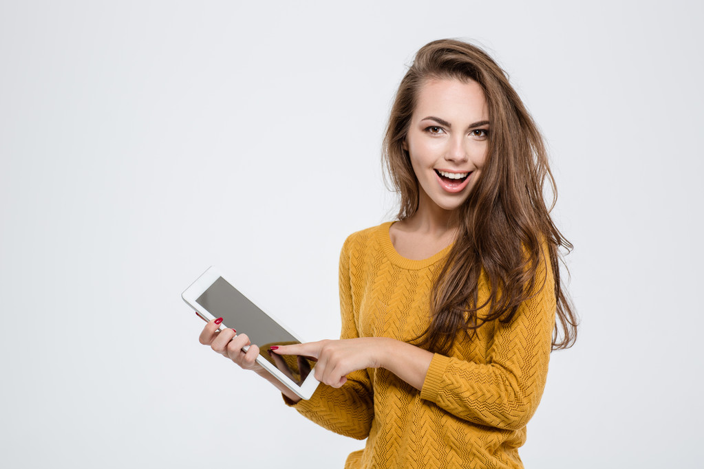 Laughing woman using tablet computer - Photo, Image