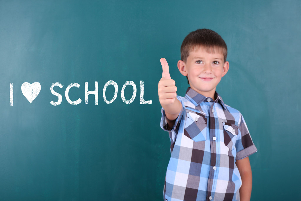 Cheerful child at blackboard - Photo, Image