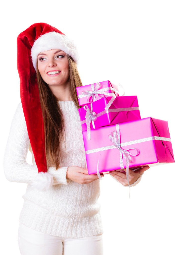 Mulher Papai Noel chapéu auxiliar com muitas caixas de presente rosa - Foto, Imagem