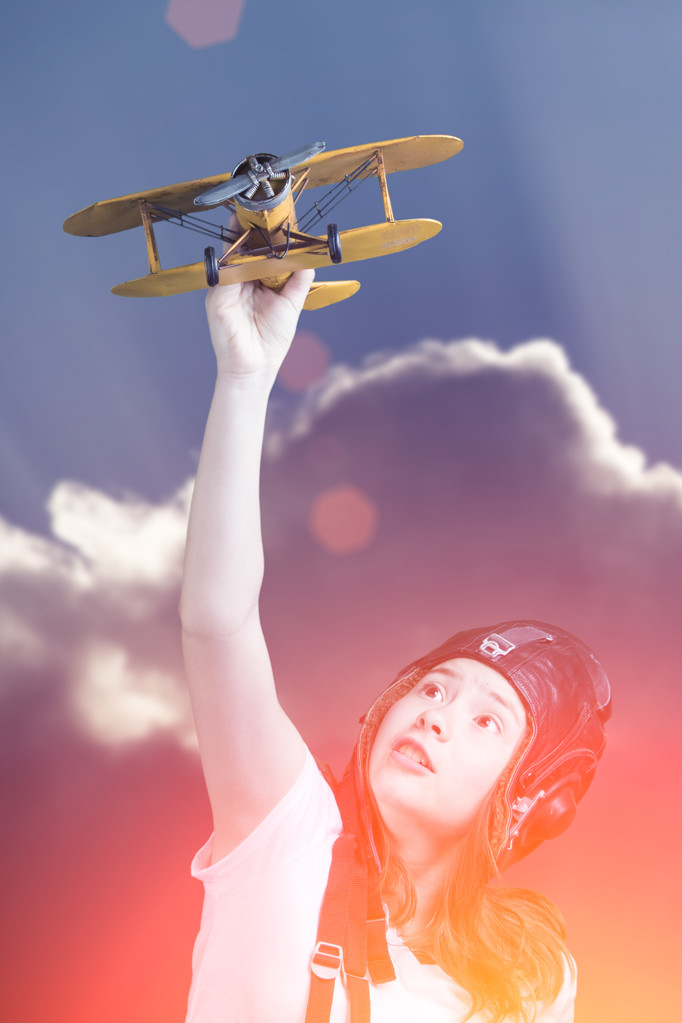 Söpö nuori tyttö lentokone malli
 - Valokuva, kuva