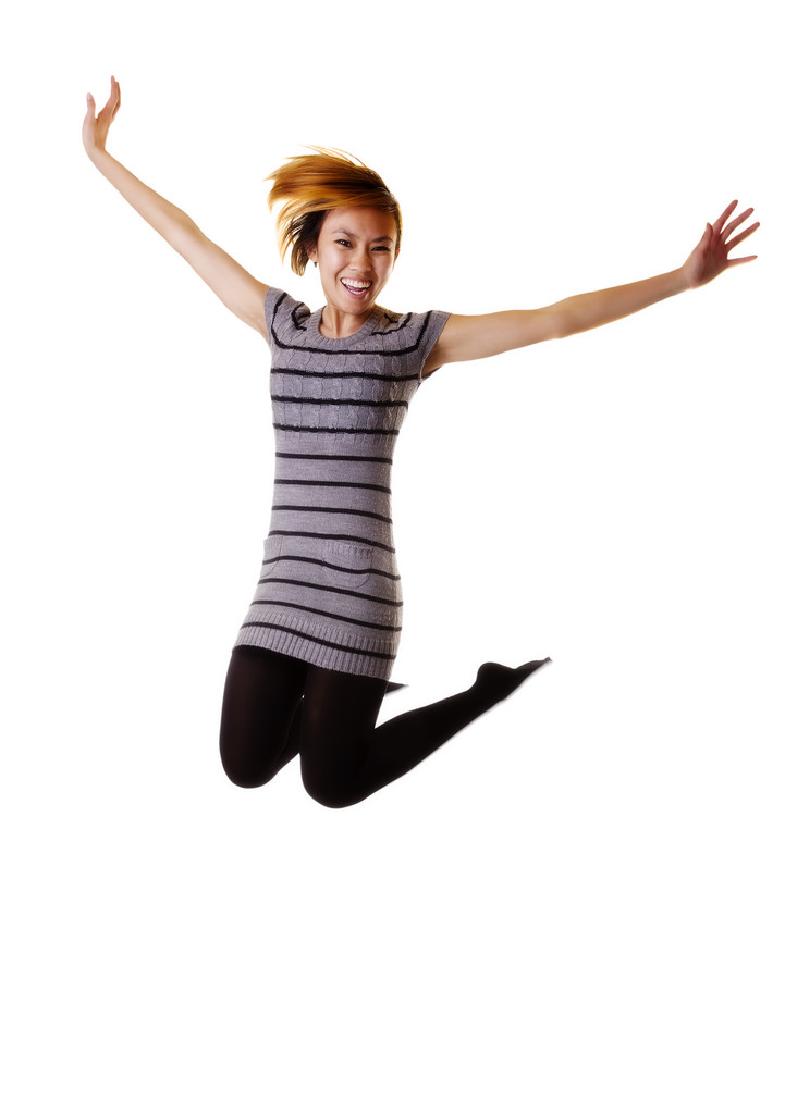 Skinny Asian American Woman Jumping In Knit Dress - Photo, Image