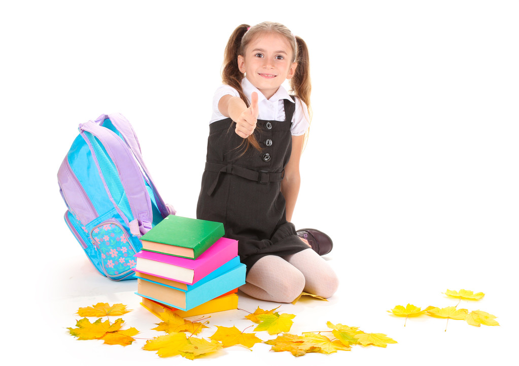 hermosa niña, libros y una mochila aislada en blanco
 - Foto, imagen