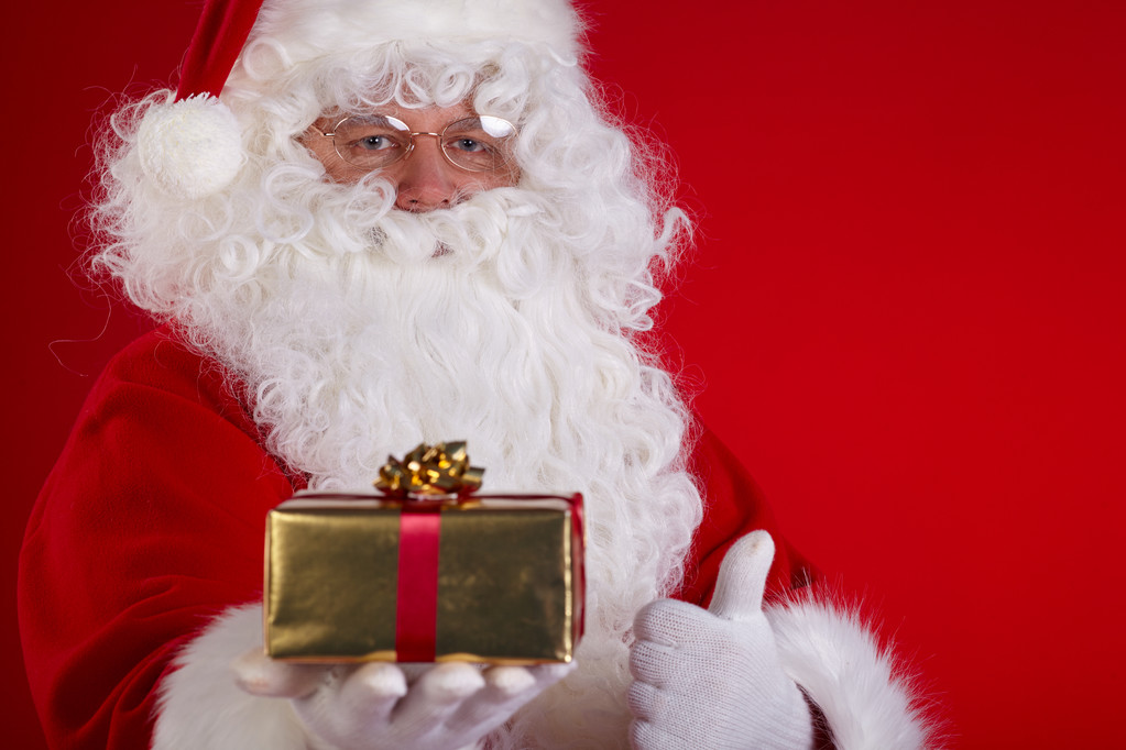 Santa Claus gospodarstwa pudełko prezentów - Zdjęcie, obraz