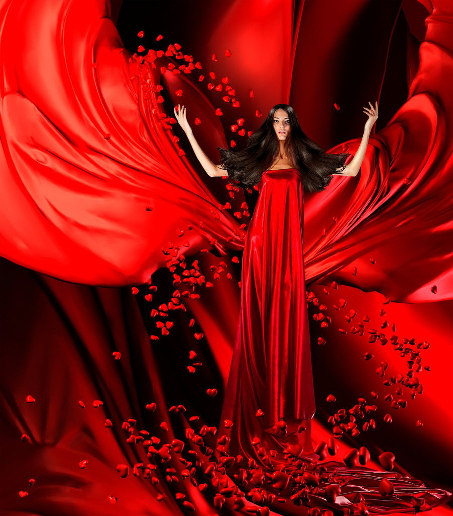 θεά του έρωτα στο κόκκινο φόρεμα με υπέροχα μαλλιά και καρδιές σε - Φωτογραφία, εικόνα