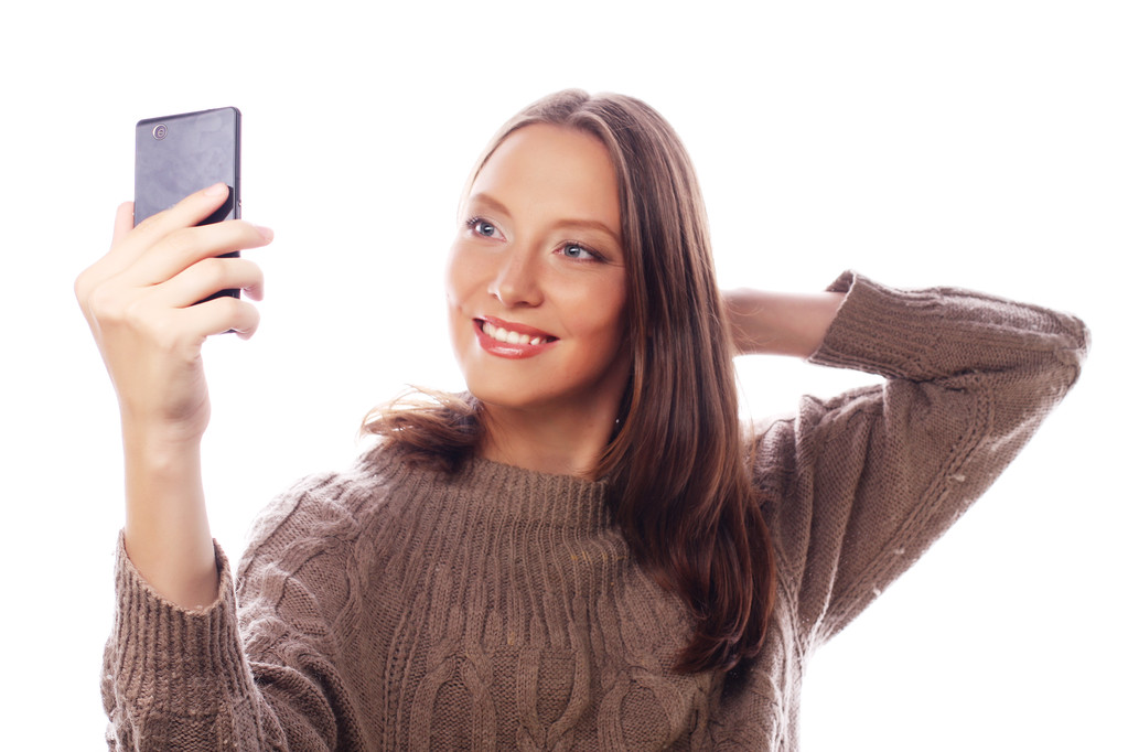 mooie vrouw nemen selfies - Foto, afbeelding