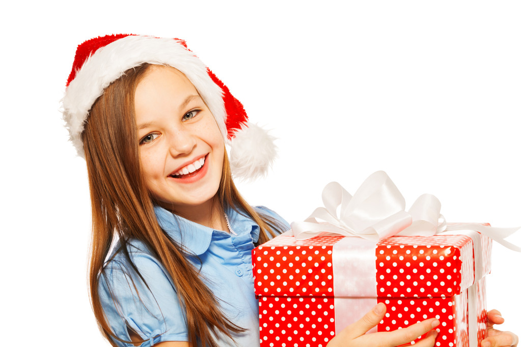 Προσωπογραφία κοριτσιού στην το καπέλο Santa με παρόν - Φωτογραφία, εικόνα