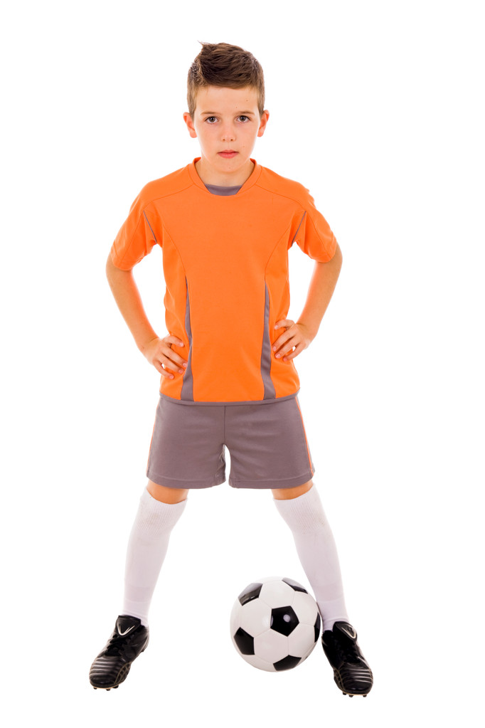 Niño con pelota de fútbol. Aislado sobre blanco
 - Foto, imagen