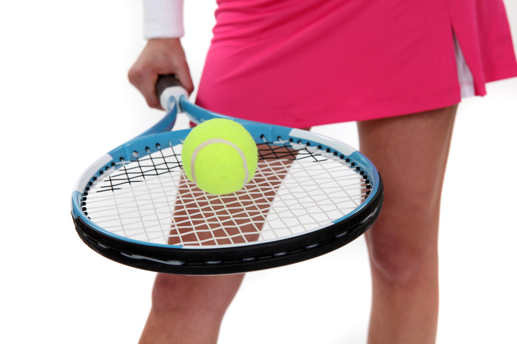 Femme tenant une raquette de tennis
 - Photo, image