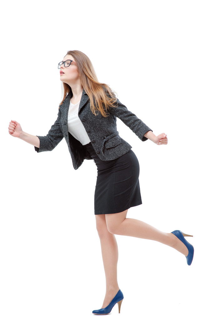 Laufende Geschäftsfrau in Formalbekleidung - Foto, Bild