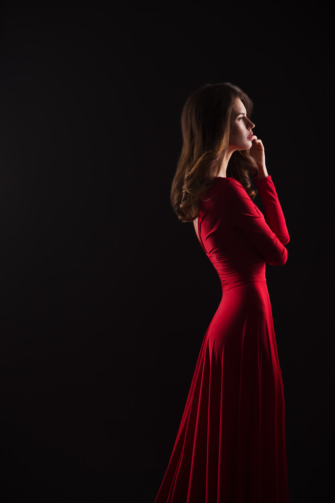 retrato de joven hermosa mujer en vestido rojo
 - Foto, Imagen