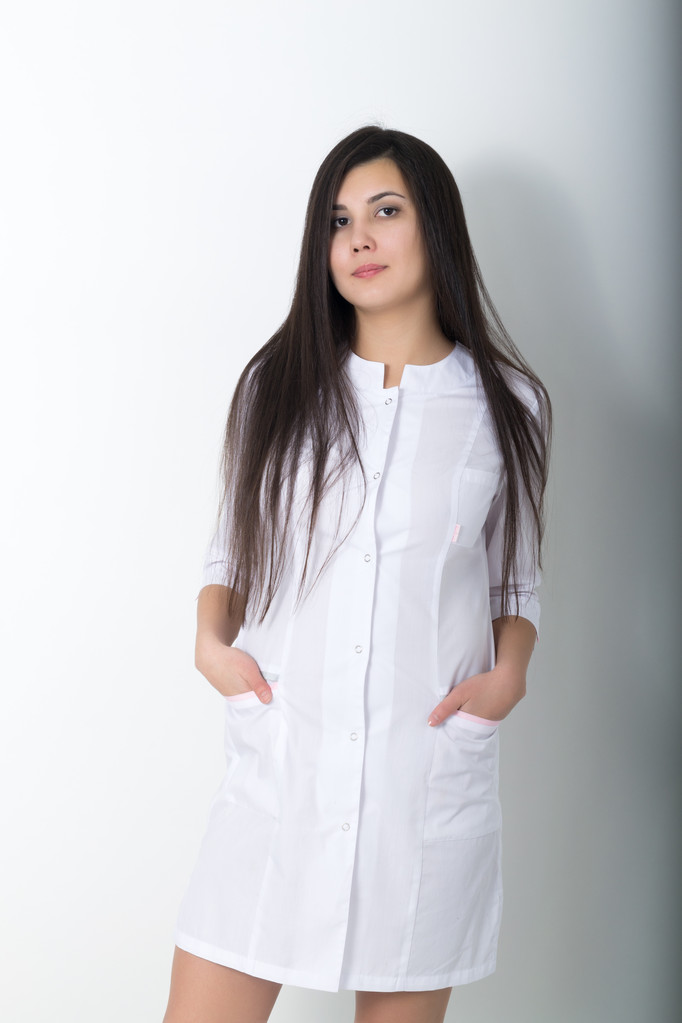 piękne młode Azji kobiece lekarz w medycznych suknia gospodarstwa wewnętrzny - Zdjęcie, obraz