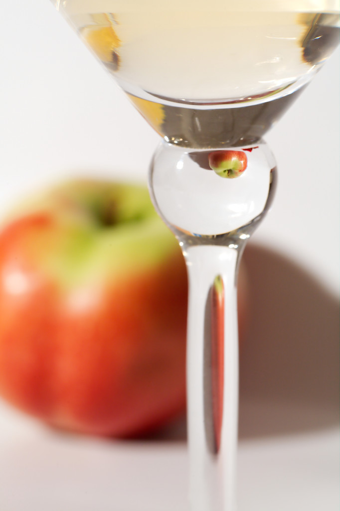 A glass of white wine with apple - Photo, Image