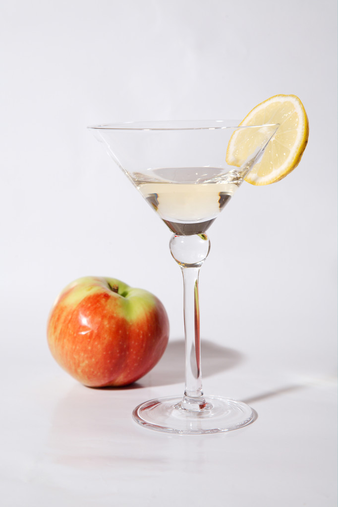 Egy pohár fehér bor, alma és citrom - Fotó, kép