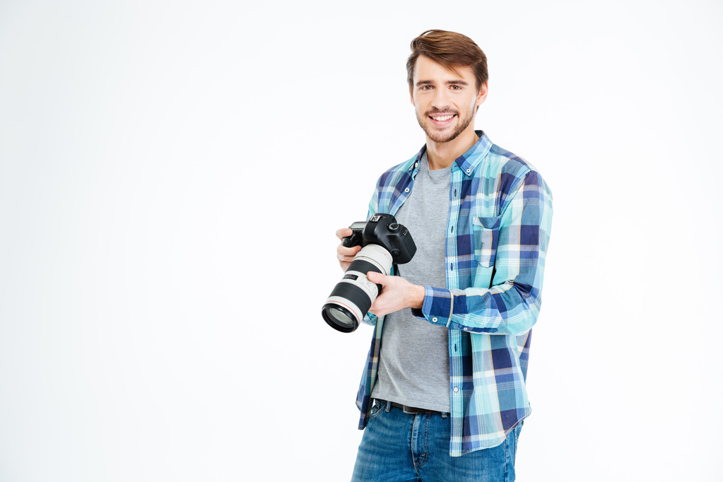 Male photographer holding photo camera  - Fotó, kép