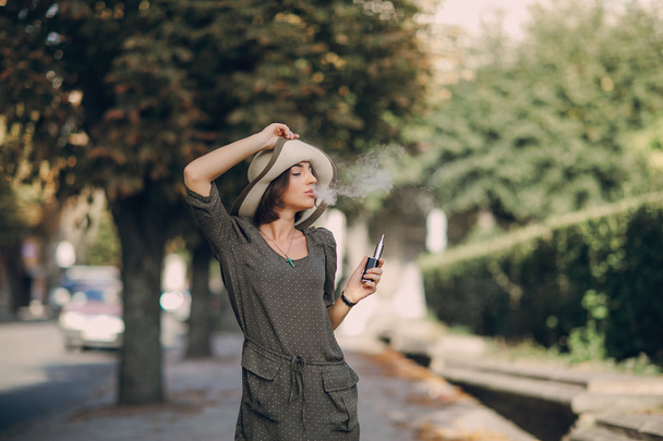 Girl with E-cigarette - Fotografie, Obrázek